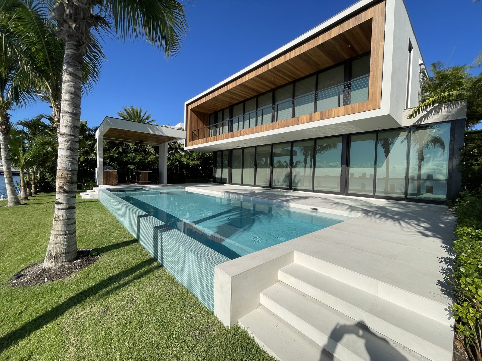 Modern waterfront residence with infinity-edge pool